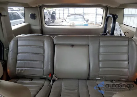 2003 Hummer H2 z USA, uszkodzony, nr VIN 5GRGN23U93H131698